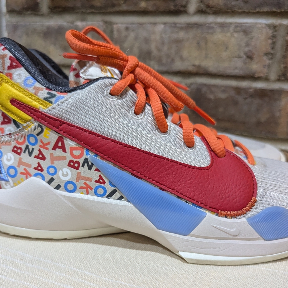 Nike Zoom Letter Bro Freak 2  Giannis Sand With Red Swoosh and Blue Accents